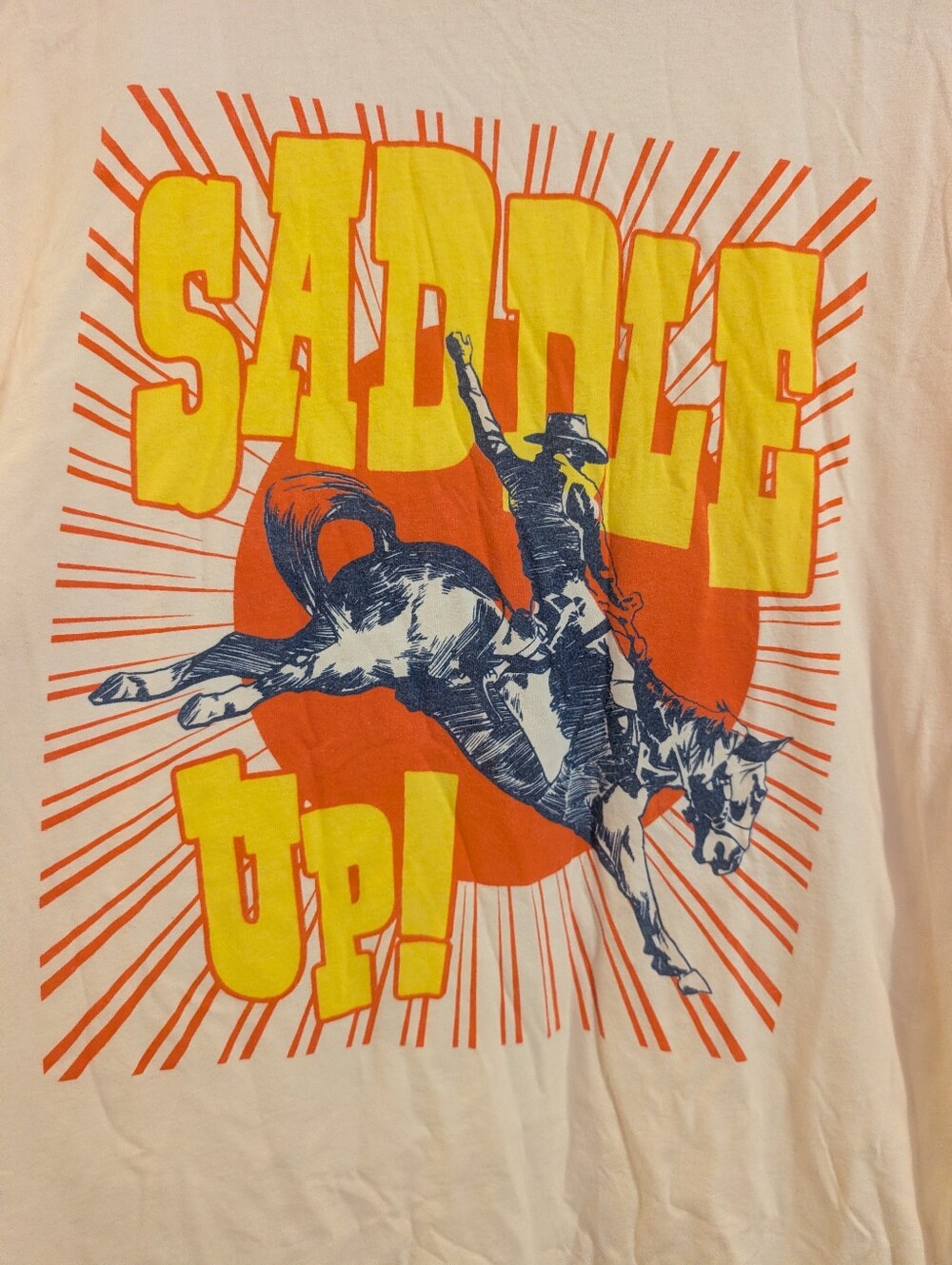 Retro Brand Saddle Up Pale Pink/Apricot Bucking Bronco Rodeo Horse Tee Women Med